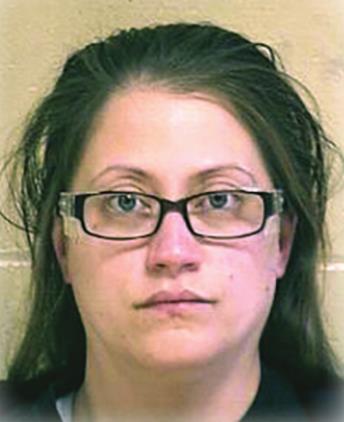Woman leaves child in car in parking lot