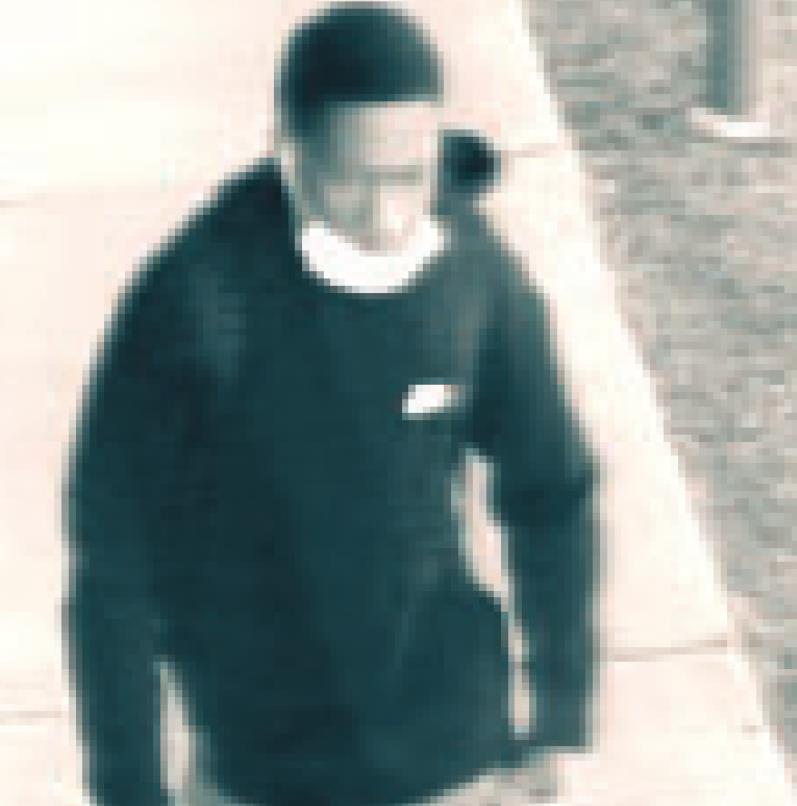 Police seek identity of robbery suspect