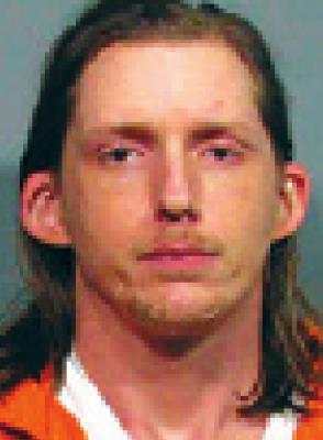 Man charged with home invasion throws motorcycle helmet at officer