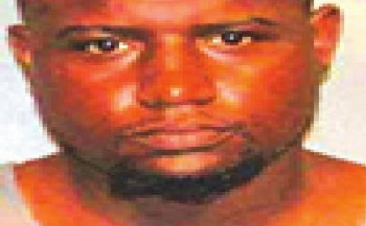 Suspect makes gestures toward waistband, found with drugs