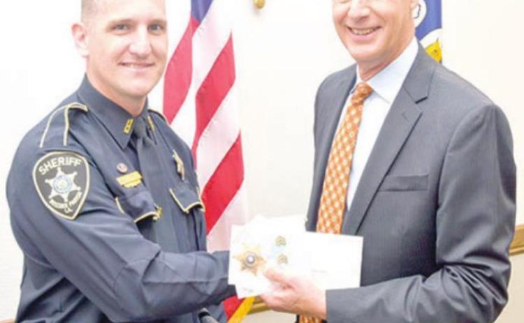 Sgt. John Carroll with Sheriff Julian Whittington