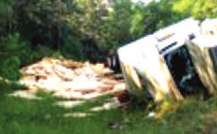 Big rig overturns on Hwy.169