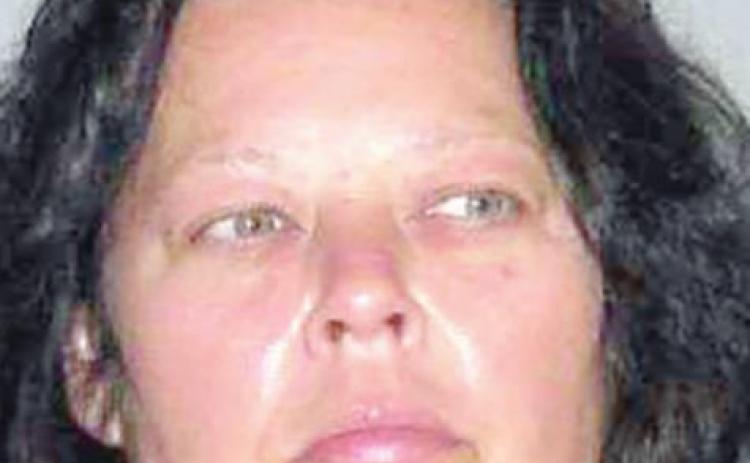 Woman pleads guilty to four robberies
