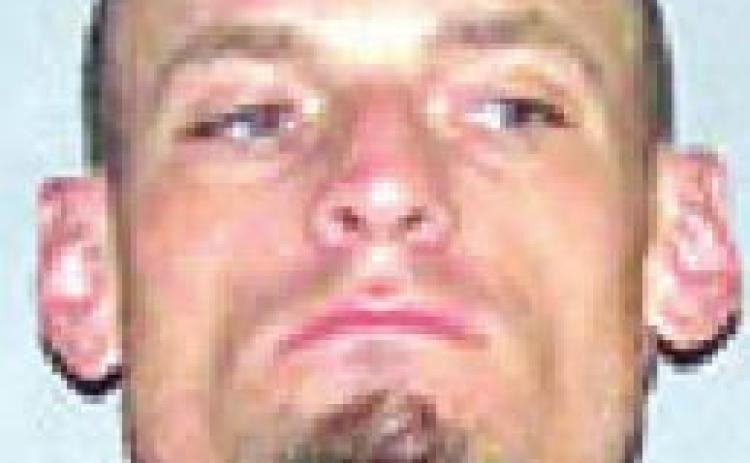 Man charged with battery for attack on his wife