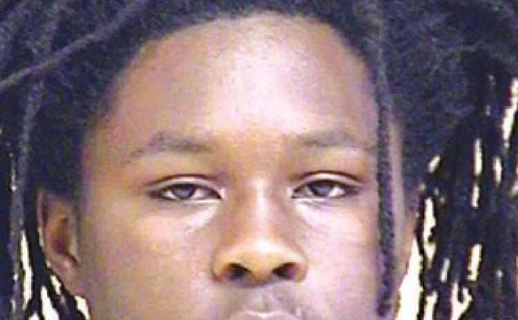 Juvenile arrested, man sought after armed robbery