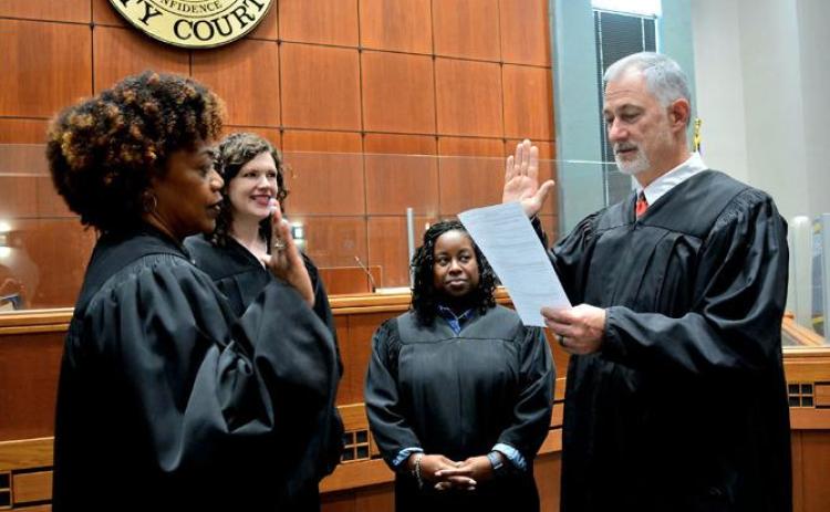 Judge Graham being sworn in.