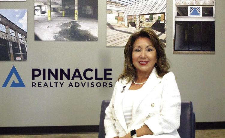 Realtors Association president assists in homebuying process