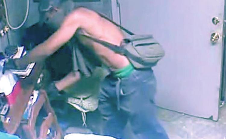 Police seek ID of burglary suspect