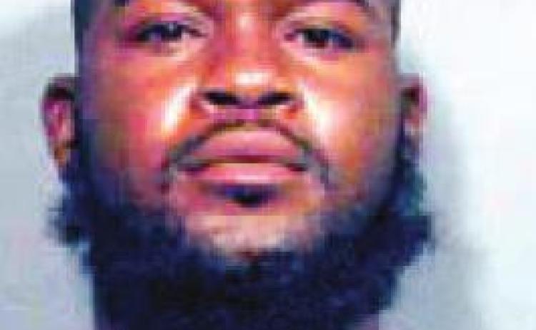 Man found with drugs points gun at officers