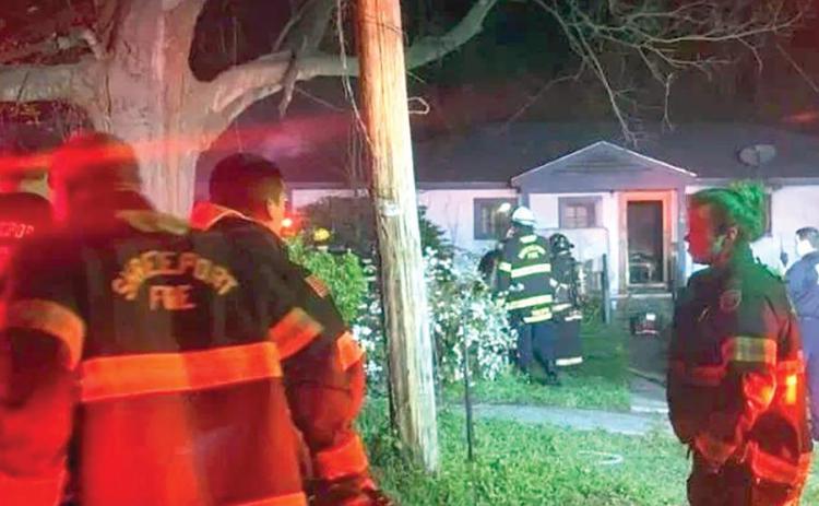 Highland house fire injures three