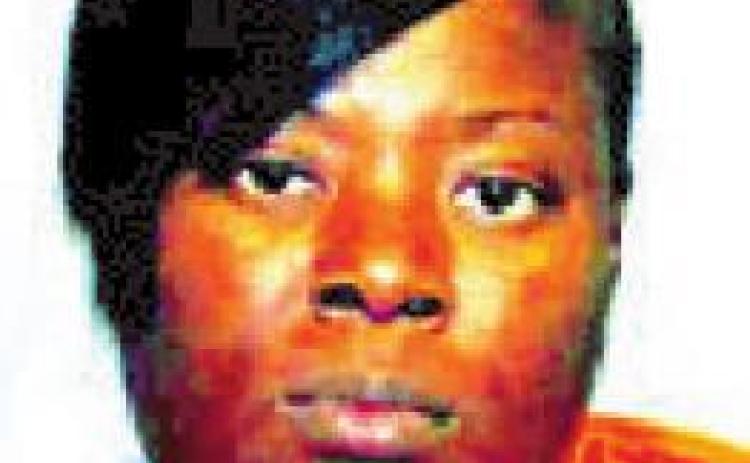 Suspect injures woman with credit card scanner
