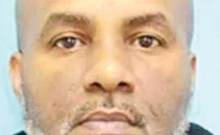 Two dead, two injured in armed robbery; suspect arrested