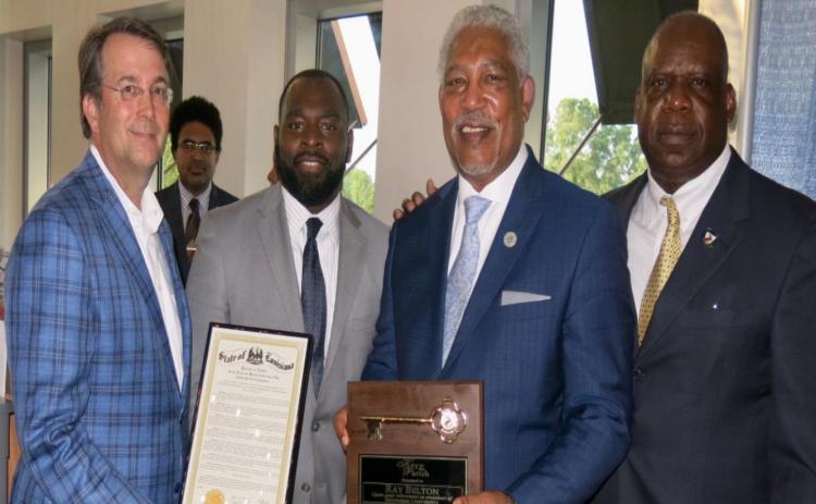 A GOURMET HOT DOG, PLEASE, FOR SOUTHERN UNIVERSITY SYSTEM PRESIDENT-CHANCELLOR RAY L. BELTON.