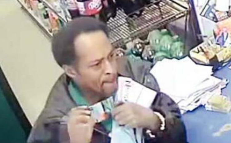 Police seek identity of robbery suspect