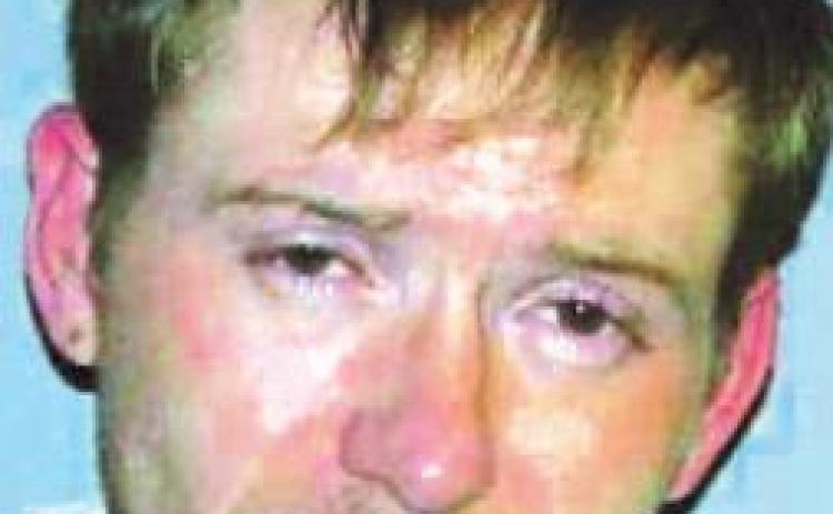 Two men charged in connection with body discovered near Wallace Lake