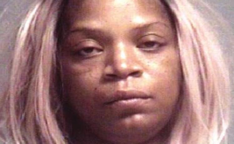 Woman fires handgun at neighbors