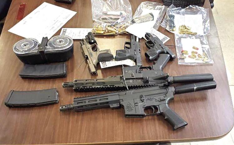 Police make multiple arrests after carjacked vehicle strikes another, suspects flee on foo