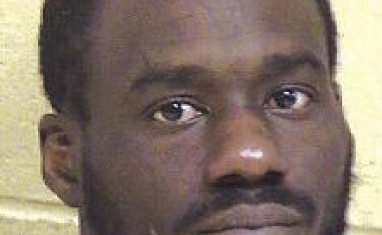 Convicted felon apprehended with firearm in domestic incident