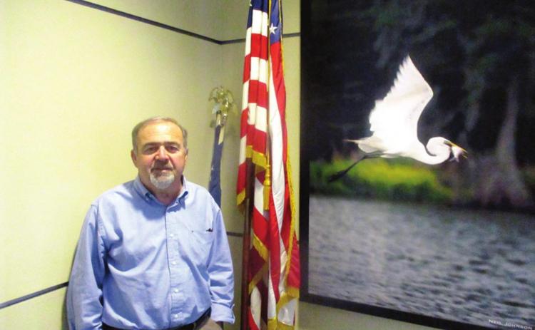 Ali Mustapha and Caddo Levee Board hold back floodwaters
