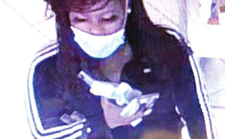 Police seek identity of theft suspect