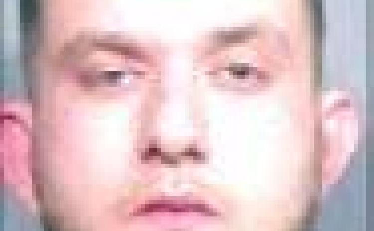 Fugitive apprehended in Greenwood