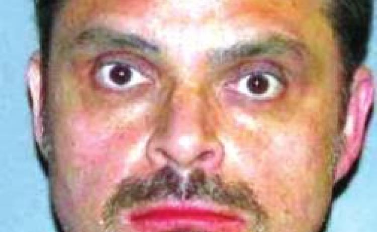 Man charged with impersonating officer
