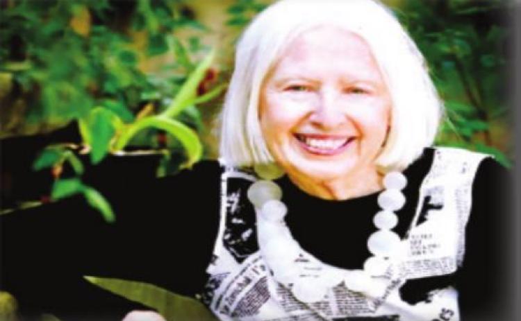 New Southern Pres., a designing woman, bridge of lights and legendary musician