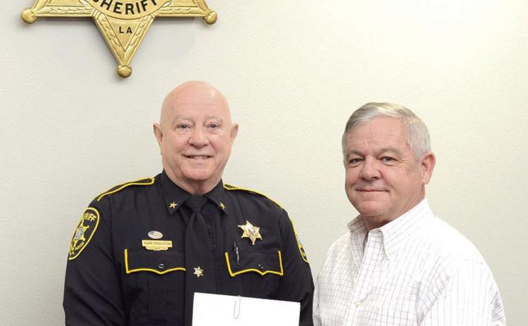 Bossier DA presents check to Bossier Sheriff's Office