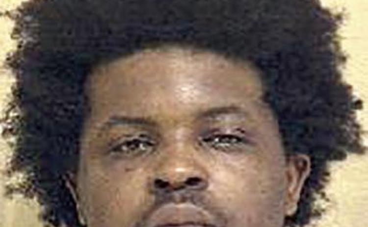 Suspicious person turns out to be felon with firearm