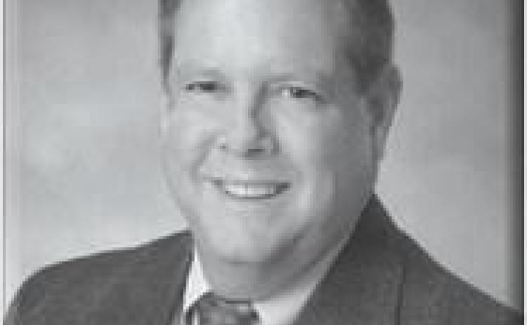 Charles R. Henington Jr. gives Caddo Assessor