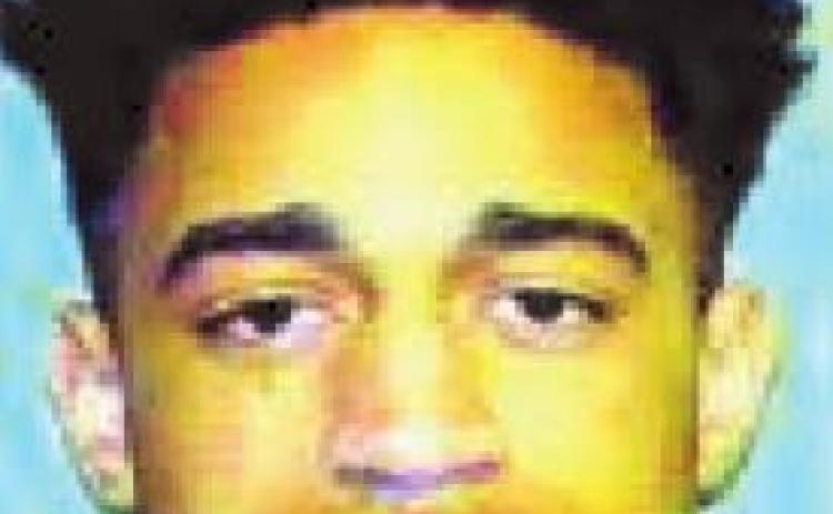 Local man sentenced to federal prison for possessing stolen firearm