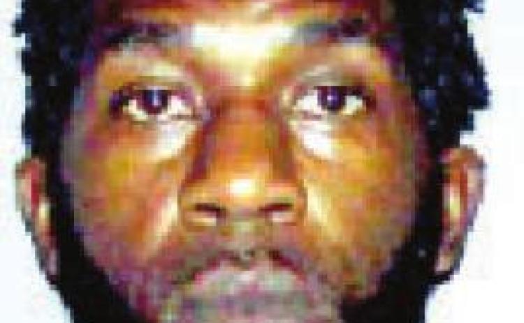 Man found with gun, hides drugs under porch