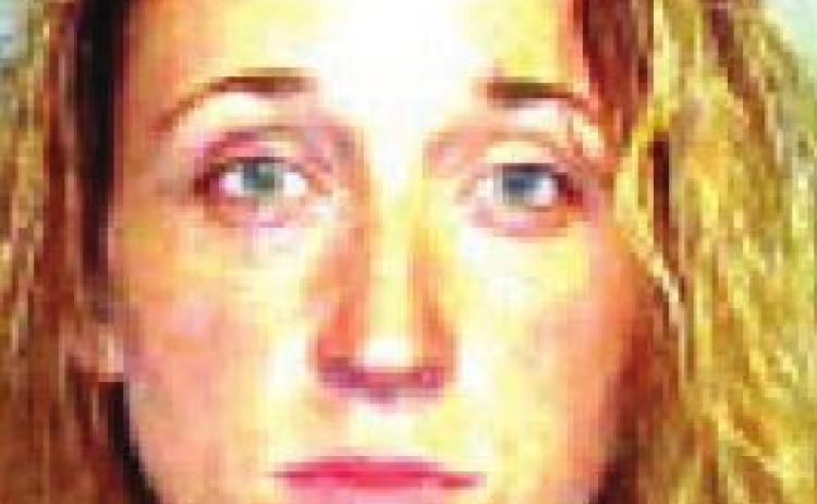 Local woman arrested for altering court order