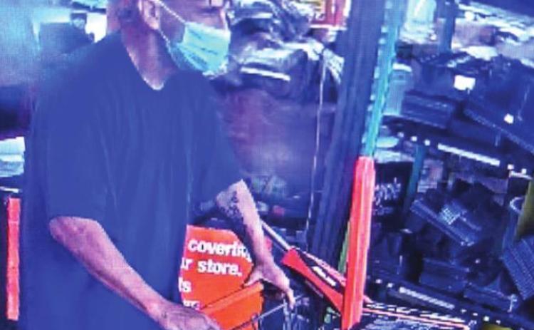 Police seek identities of two theft suspects