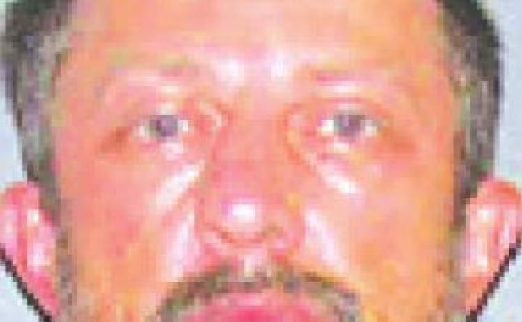 Suspect found behind motel with narcotics, paraphernalia
