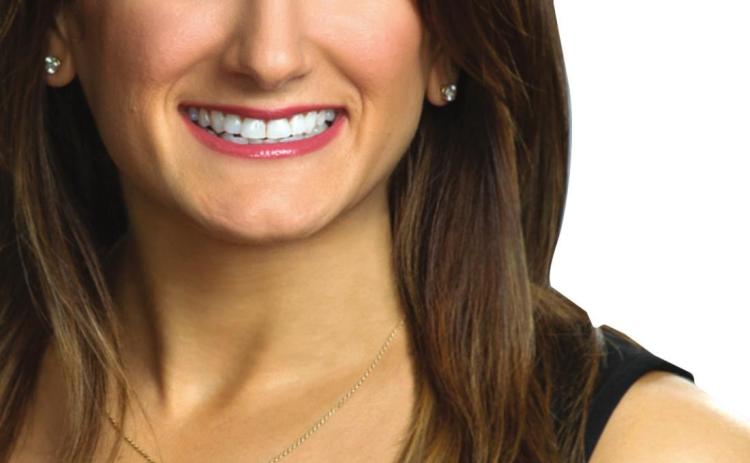 Ashley Busada wins 40 Under 40 Award in economic development