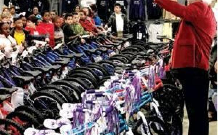 Caddo elementary students get early Christmas thanks to D.A.