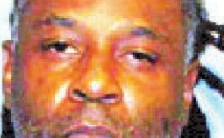 Man pushes victim from wheelchair, charged with battery