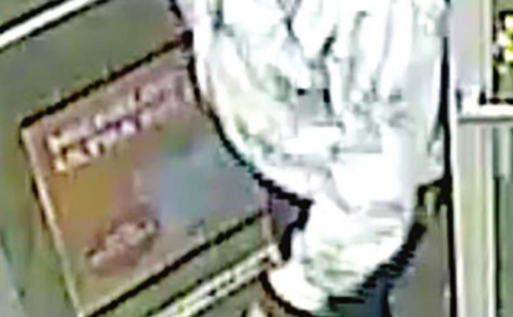 Police seeking identity of armed robbery suspect