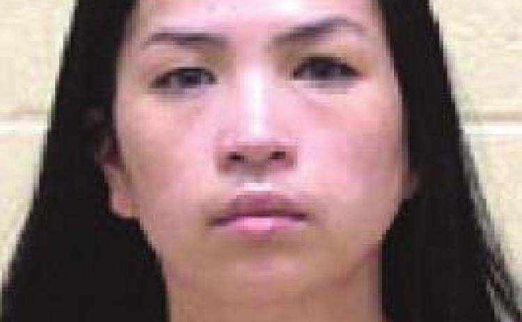 Woman arrested after trying to obtain prescription drugs