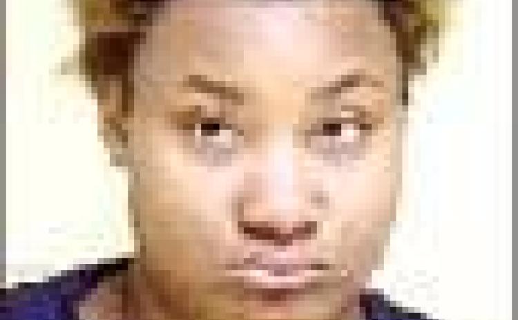 Woman charged with carnal knowledge of boy