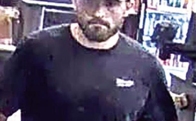 Police seek two suspects for access device fraud