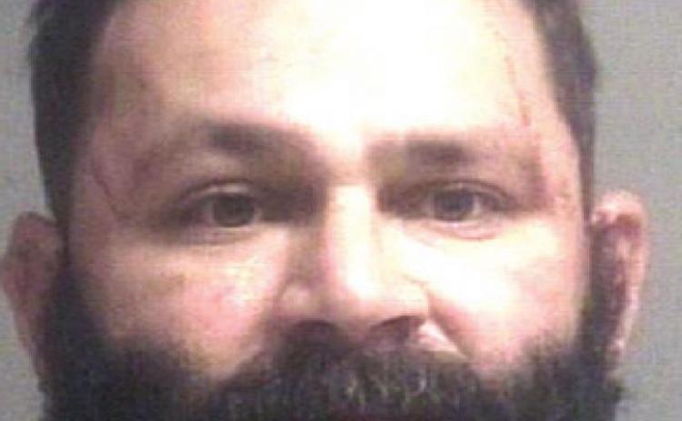 Man punches girlfriend, arrested after standoff