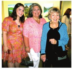 BELOW: Student artist Anne Michele Erwin, Stacy Erwin and Marti Powell. AN ARTY AFFAIR