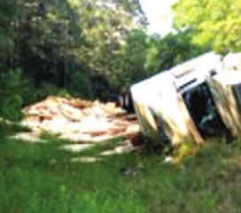 Big rig overturns on Hwy.169