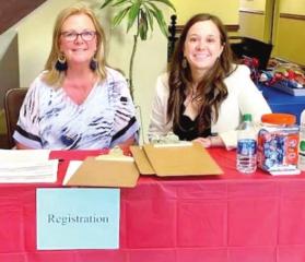 Hon Katherine Dorroh, president of the Harry V. Booth-Judge Henry A. Politz American Inn of Court, and attorney Sarah Giglio. Wills for Heroes prepares 21 will packages for first responders