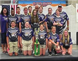Benton Middle School Archery Team with trophy.