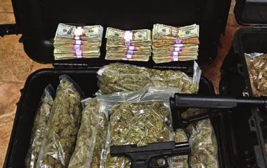 Man behind bars for possession of drugs, guns
