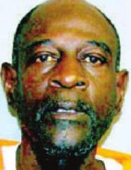 Coleman Man charged with bribery, domestic abuse battery
