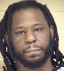Lawrence Felon arrested with firearm during search warrant